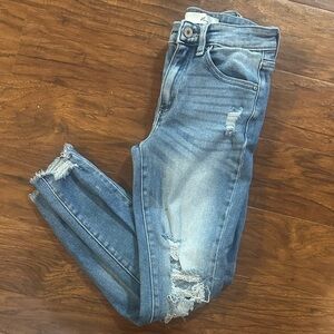 Distressed Blue Jeans